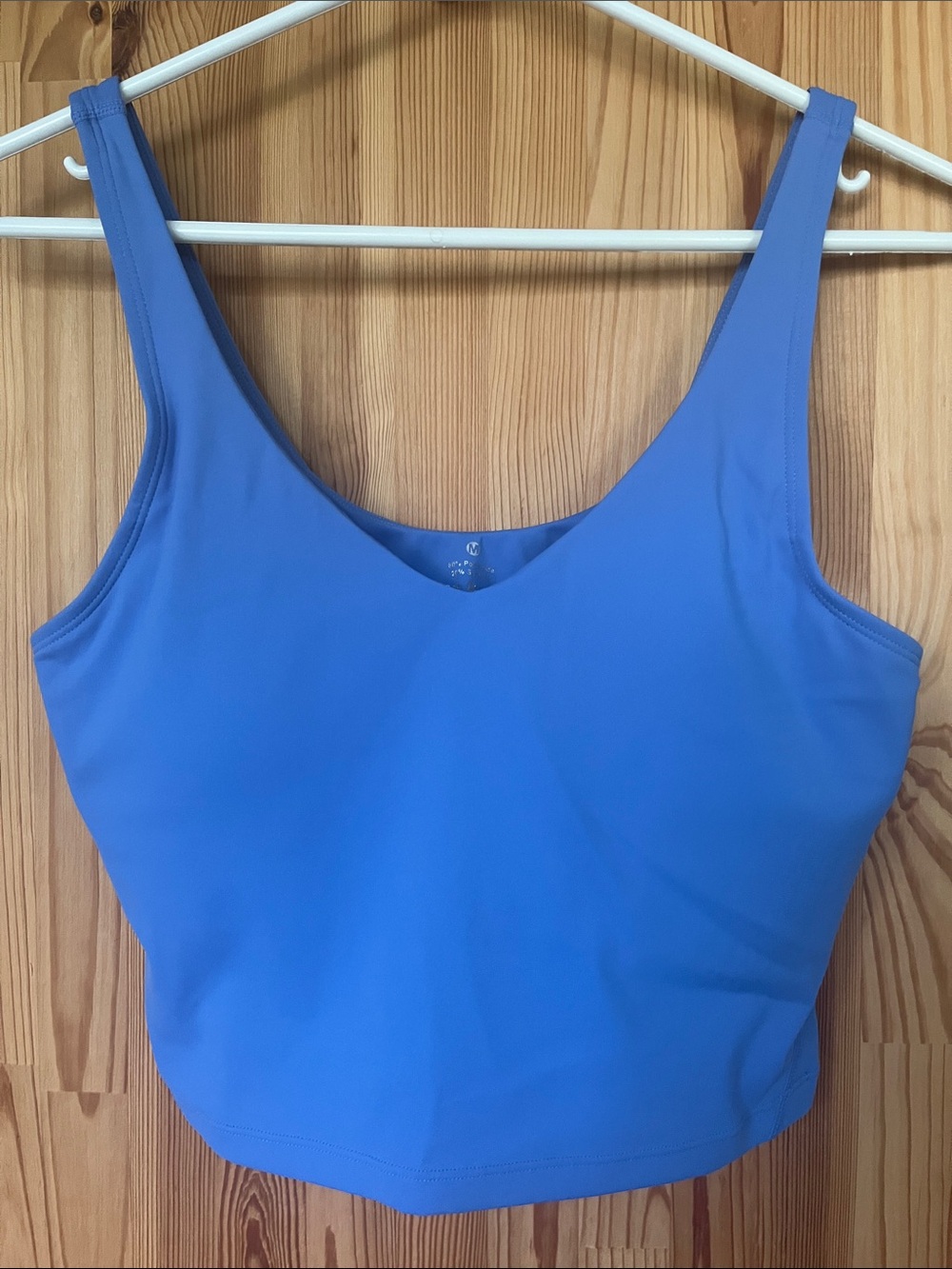 Blue cropped workout tank (size M)